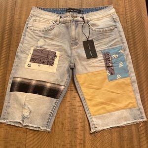 Men’s Denim Shorts Sz 32. Patchwork Style, and Length is Right above the Knee.